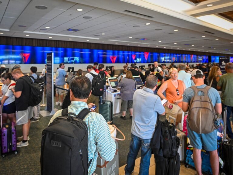 Afp 20240720 2162061849 V1 Highres Majoritoutagegroundsflightsandimpactsbusines 1721457435.jpg