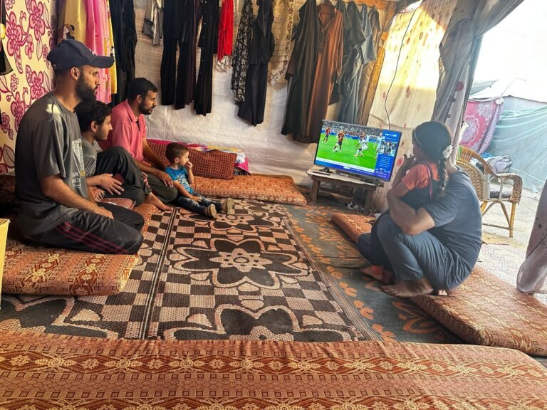 Omar In Pink And Mohammed With His Daughter Toqa Right Are Watching The Preperations Of Spain Ahead Of The Final 1720904326.jpg