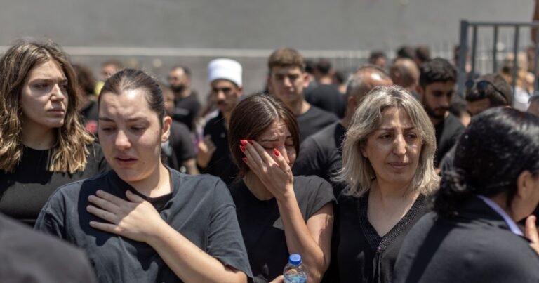 Residents Mourn At A Soccer Field That Was Hit By A Rocket Killing Multiple Children And Teenagers In The Druze Town Of Majdal Shams In The Golan Heights Northern Israel On Sunday July 28 20.jpg