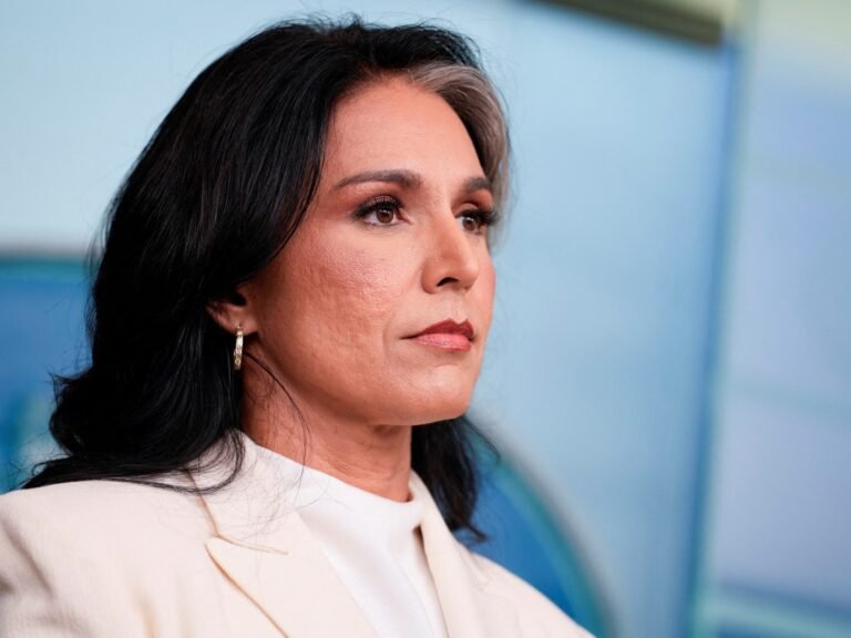 2025 08 19t205415z 1355469346 rc2isfaw76fc rtrmadp 3 usa trump gabbard intelligence revocation 1755637177.jpg